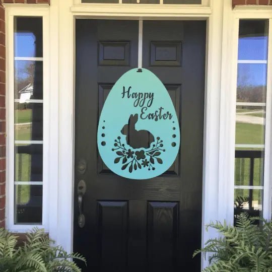 Turquoise Easter egg metal door hanger with bunny and floral design, black front door décor, custom powder coated seasonal welcome sign, farmhouse entry accent