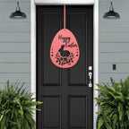 Black front door with pink Happy Easter egg metal sign, green plants exterior, seasonal farmhouse entry décor, custom powder coated welcome wall art sign