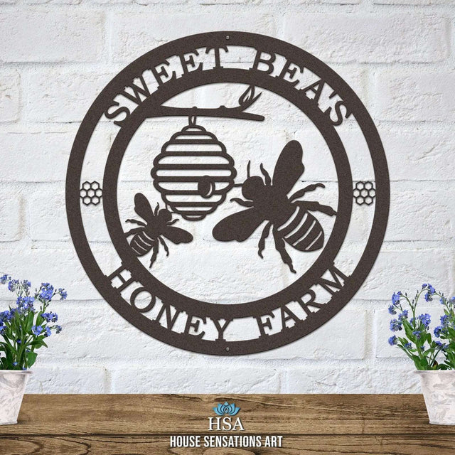 Oil-rubbed bronze laser cut ranch sign with bee silhouettes, beehive, honeycomb accents, and “SWEET BEA'S HONEY FARM” text; rustic garden decor.