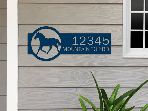 Capri Blue metal address sign with a horse silhouette on the right and the custom address '12345 Mountain Top Rd' on the left, featuring bold, clear lettering and a rustic design for outdoor use.