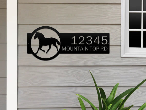 Black metal horse sign with '12345 Mountain Top Rd' on left and silhouette on right in bold rustic design, ideal for outdoor use.