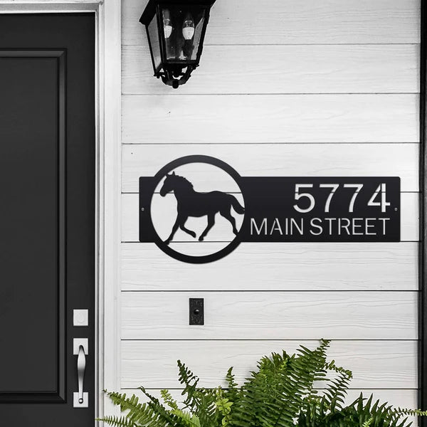 Black metal address sign with a horse silhouette on the right and the custom address '5774 Main Street' in bold, rustic lettering for outdoor use.
