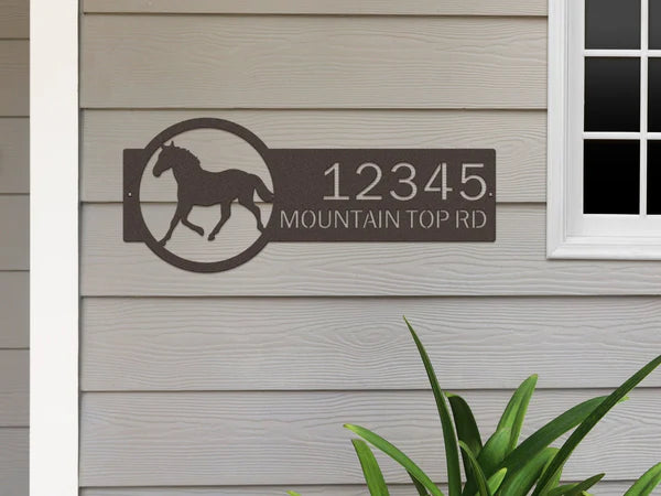 Oil rubbed bronze address sign with  horse on right and '12345 Mountain Top Rd' in bold clear text on left, made for outdoor display.