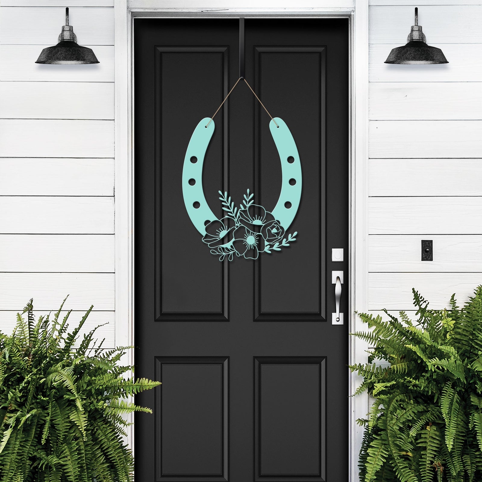 Turquoise floral horseshoe metal wall art on black door with green plants, lucky farmhouse décor, decorative home gift sign