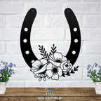 Black floral horseshoe metal wall art on white brick wall, lucky farmhouse décor, decorative home sign, House Sensations Art design