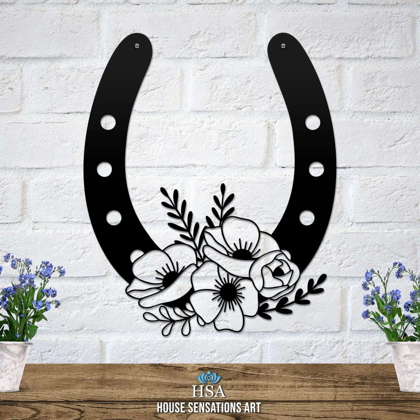 Black floral horseshoe metal wall art on white brick wall, lucky farmhouse décor, decorative home sign, House Sensations Art design