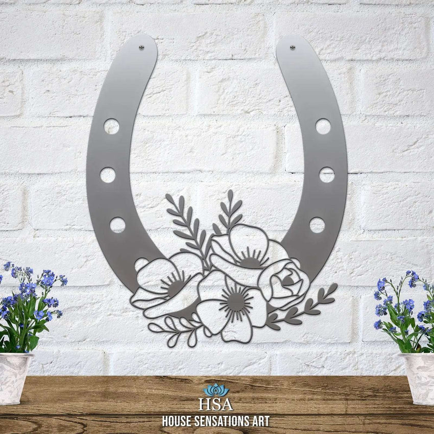 Silver floral horseshoe metal wall art on white brick wall, lucky farmhouse décor, House Sensations Art HSA branded decorative home sign