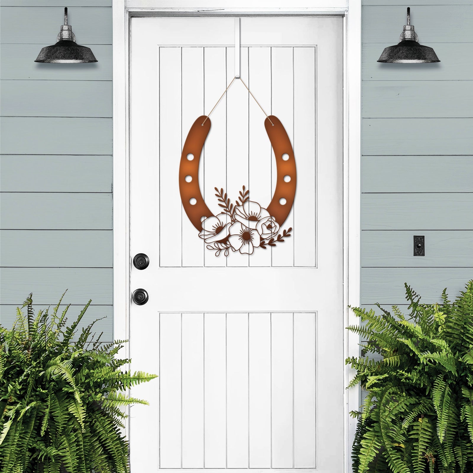 Bronze floral horseshoe wall art on white door, lucky farmhouse décor, decorative home sign, light blue background, gift horseshoe design
