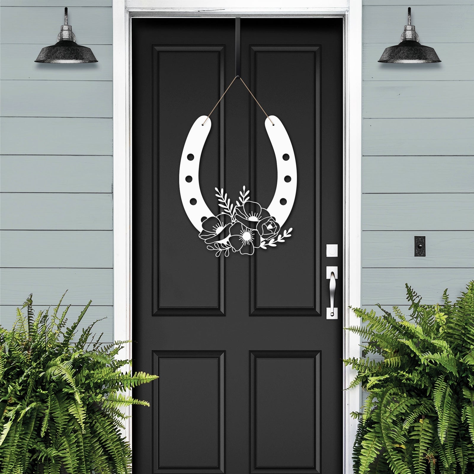 Floral horseshoe metal wall art on black door, lucky farmhouse décor, decorative home sign, blue wall background, gift horseshoe design