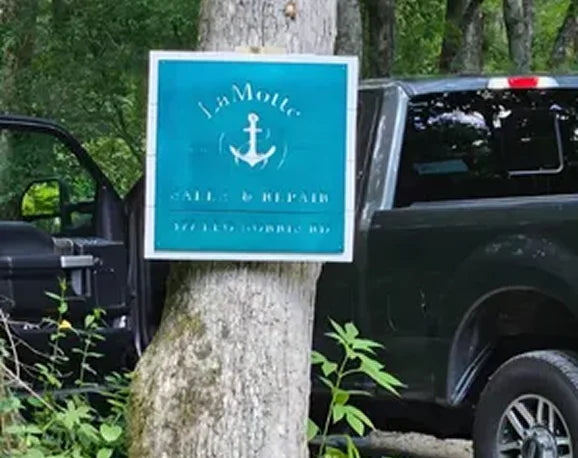 Custom blue anchor business sign