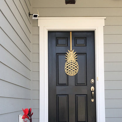 Pineapple Front Door Wreath - Customizable Metal Door Decor featuring a gold pineapple on a black surface, symbolizing hospitality, perfect for enhancing home entryways or gardens with personalized, durable, weather-resistant design.