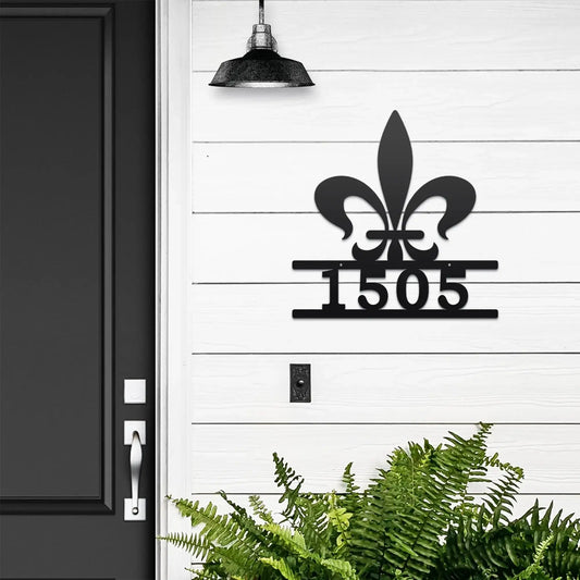 Fleur De Lis Address Sign showcasing precise metal cut details, mounted on a white wall, ideal for home décor and housewarming gifts.