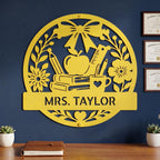 Spring Yellow Teacher Name Sign shown on Navy Blue wall above Teacher's Desk - makes the perfect gift for teacher for any first day of school or end of school year celebration