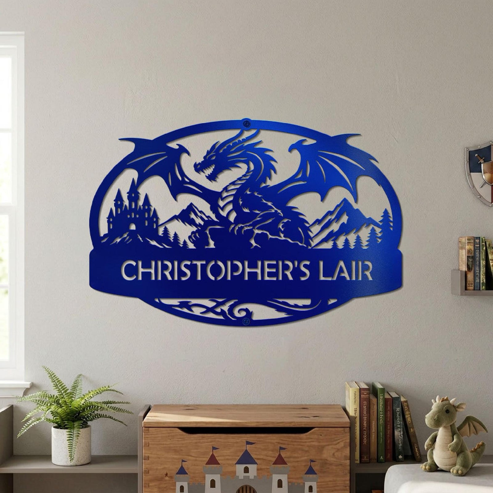 Candy Cobalt Blue Oval Dragon Sign featuring a striking dragon with medieval background. Sign is displayed on bedroom wall above toy chest.