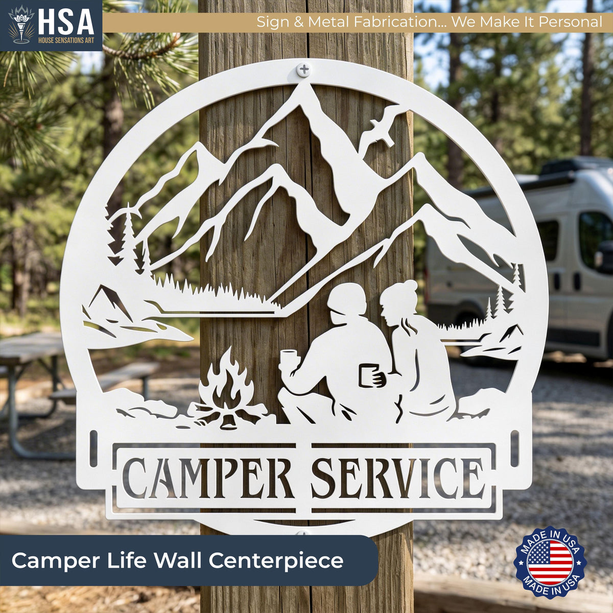 Custom camper sign: round metal trailer name plate with mountains, trees, campfire and two campers for outdoor lake decor.