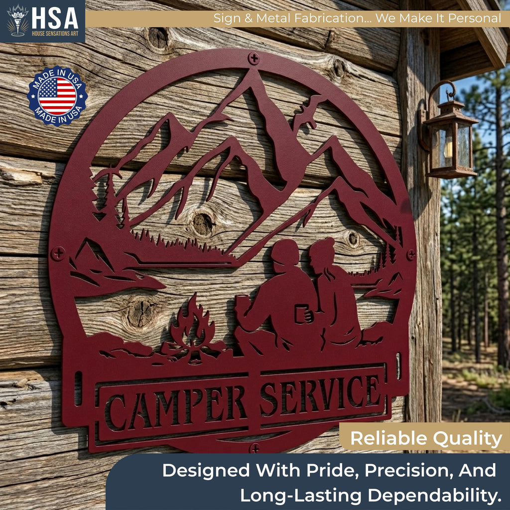 Custom round burgundy metal camper sign showing mountains, a campfire couple, with CAMPER SERVICE, RV outdoor decor.