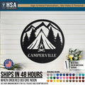 Custom CamperVille round metal camper sign: mountains, pines, and a central tent; camping wall decor.