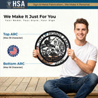 Personalized round farmhouse metal sign with cute barnyard animals, perfect for entryway decor, held by a smiling man.