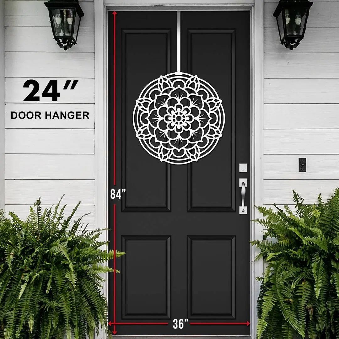 Decorative mandala door hanger, 24 inches in diameter, displayed on a black front door with white trim, showcasing intricate lotus-inspired design, durable metal craftsmanship, and clear size for scale.