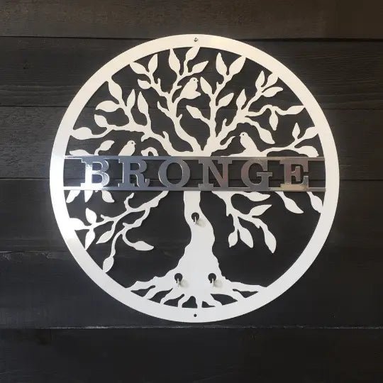 Brushed silver tree metal sign with personalized text, custom metal wall art on wood backdrop, modern rustic décor, powder coated outdoor sign design