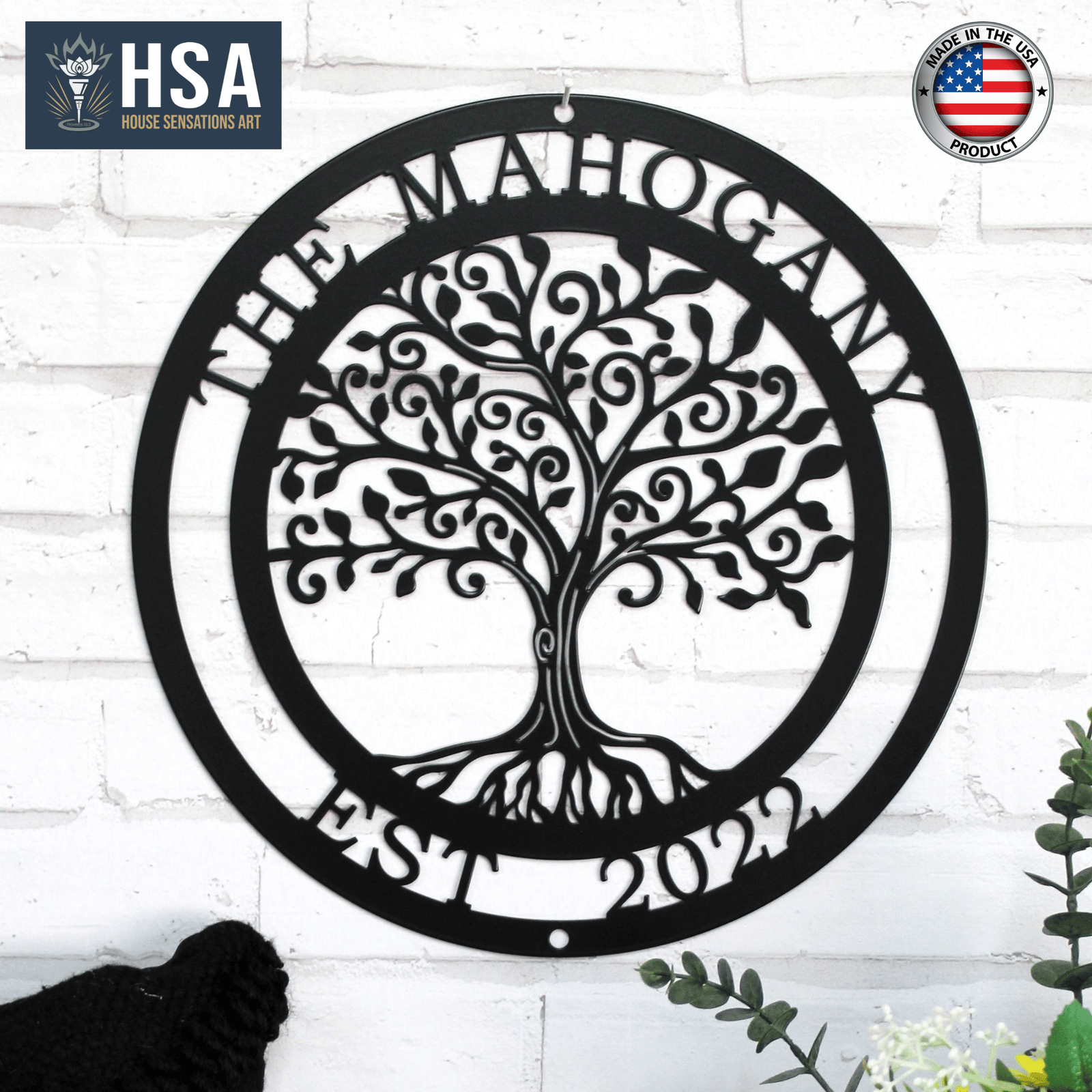 Personalized tree of life metal wall décor with intricate design, displayed on a white brick wall, featuring HSA branding, ideal for custom home décor and personalized gifts.