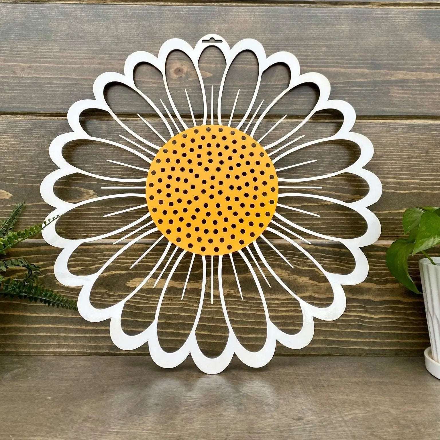 Decorative metal sunflower wall art on wooden background, custom indoor or outdoor home décor accent