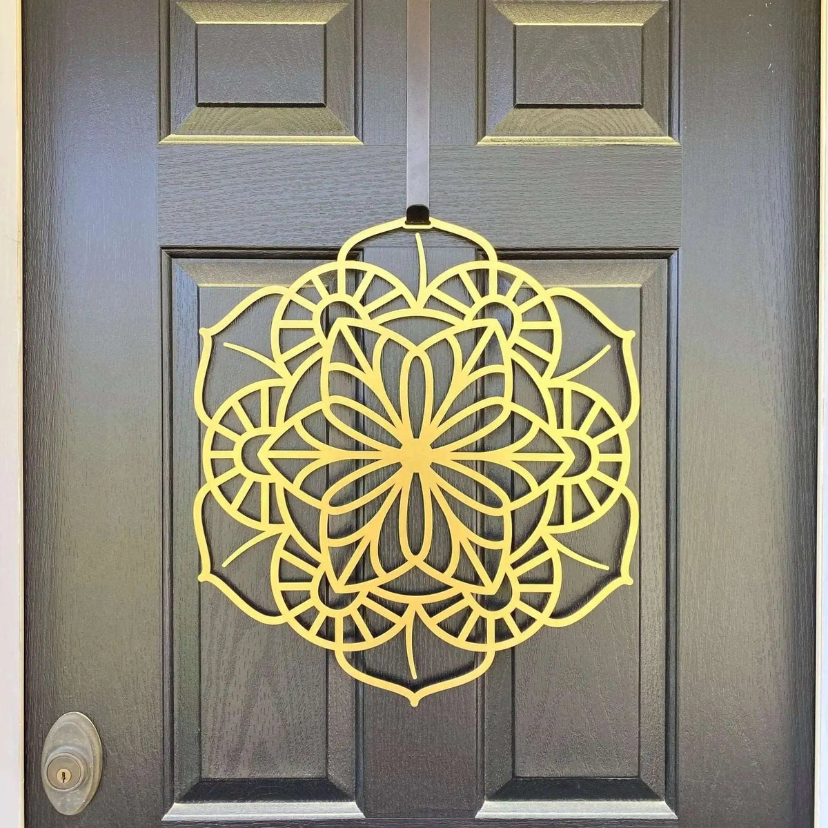 Yellow floral mandala metal wall art on dark wood door, custom powder coated front door décor, farmhouse entry welcome sign, elegant outdoor metal wall art design
