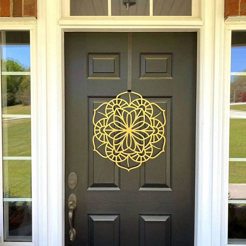 Yellow floral mandala metal door hanger on gray front door with glass panels, custom powder coated entry décor, farmhouse welcome wall art, elegant exterior metal sign design