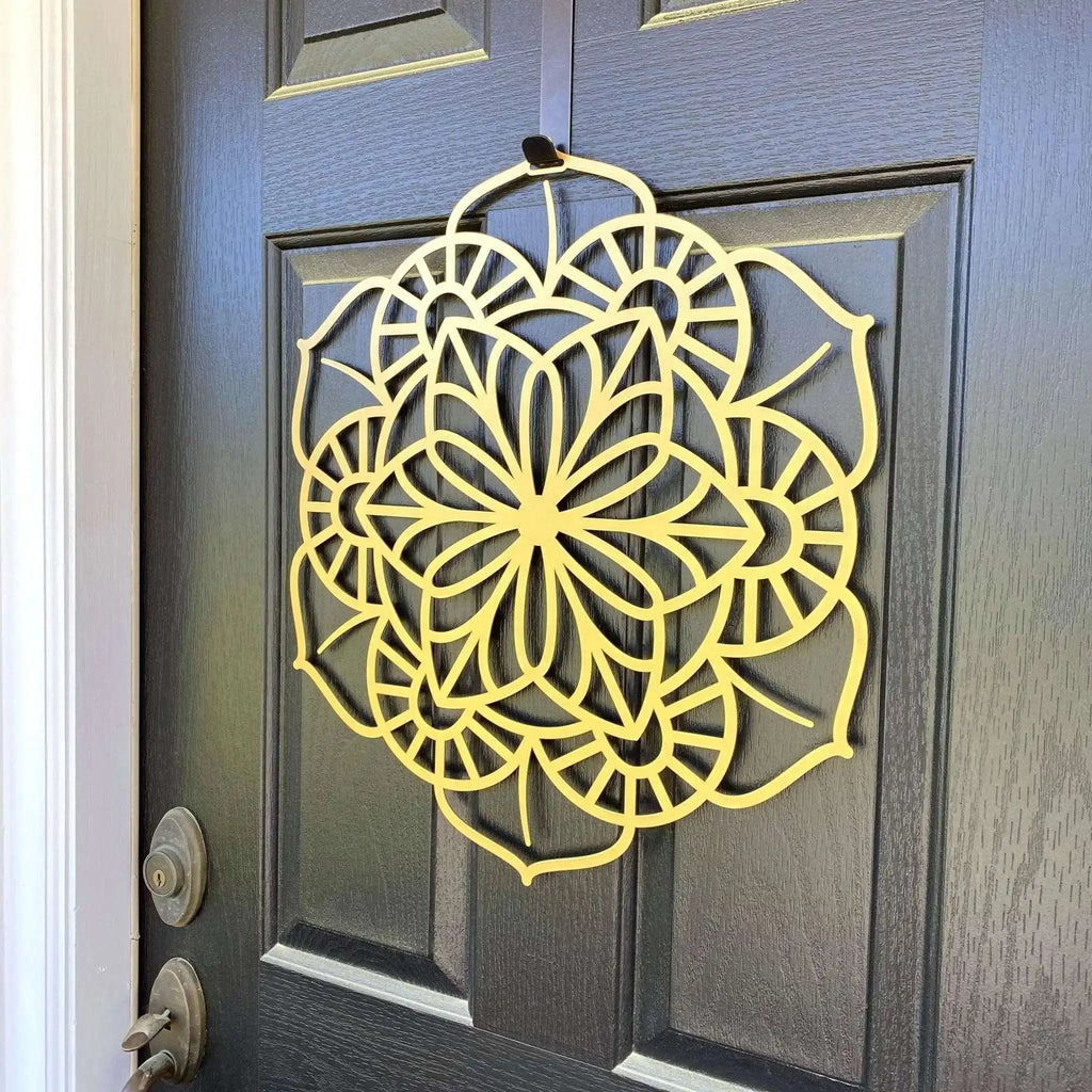 Yellow floral mandala metal wall art on dark gray door, side view, custom powder coated farmhouse entry décor, elegant front door welcome sign design
