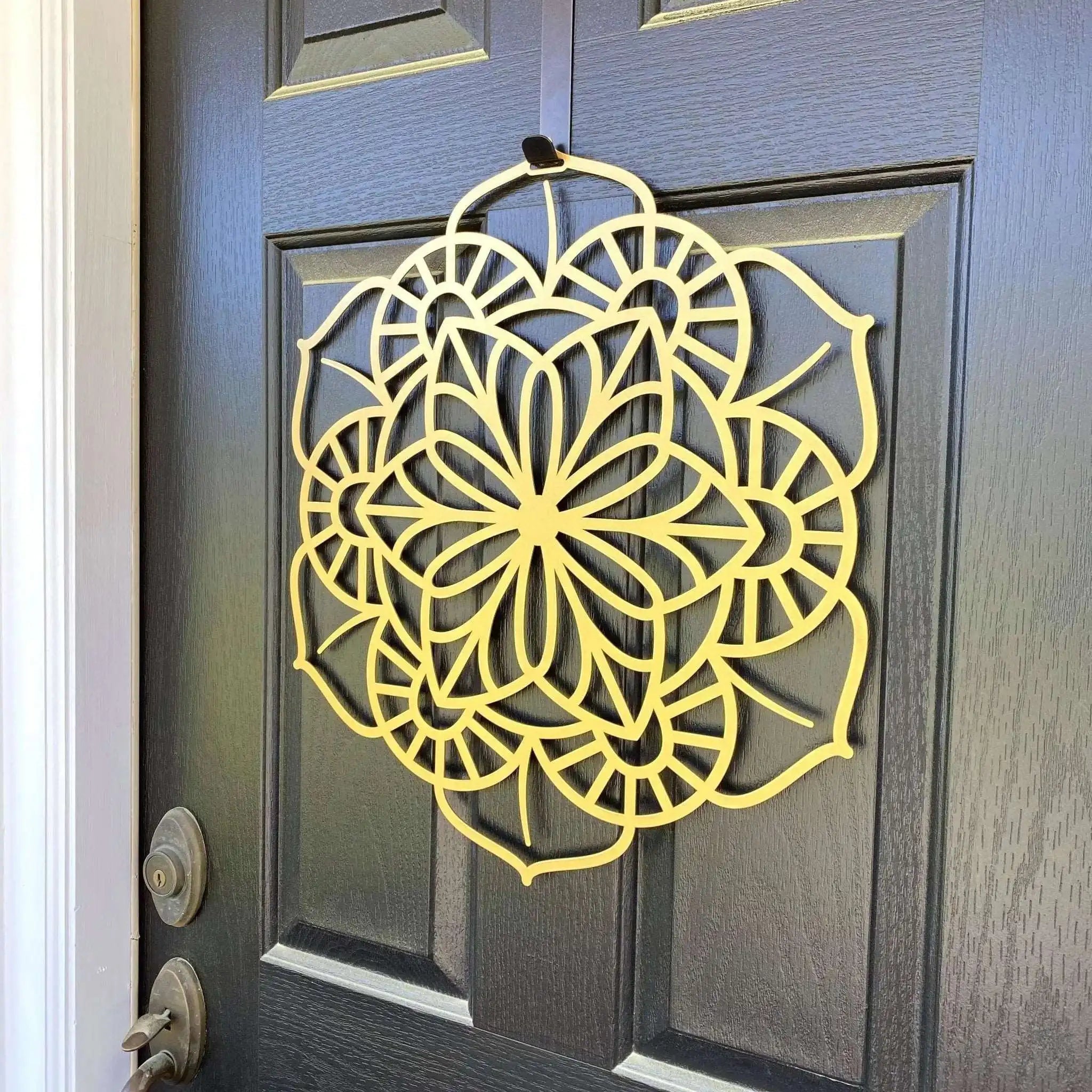 Yellow floral mandala metal wall art on dark gray door, side view, custom powder coated farmhouse entry décor, elegant front door welcome sign design