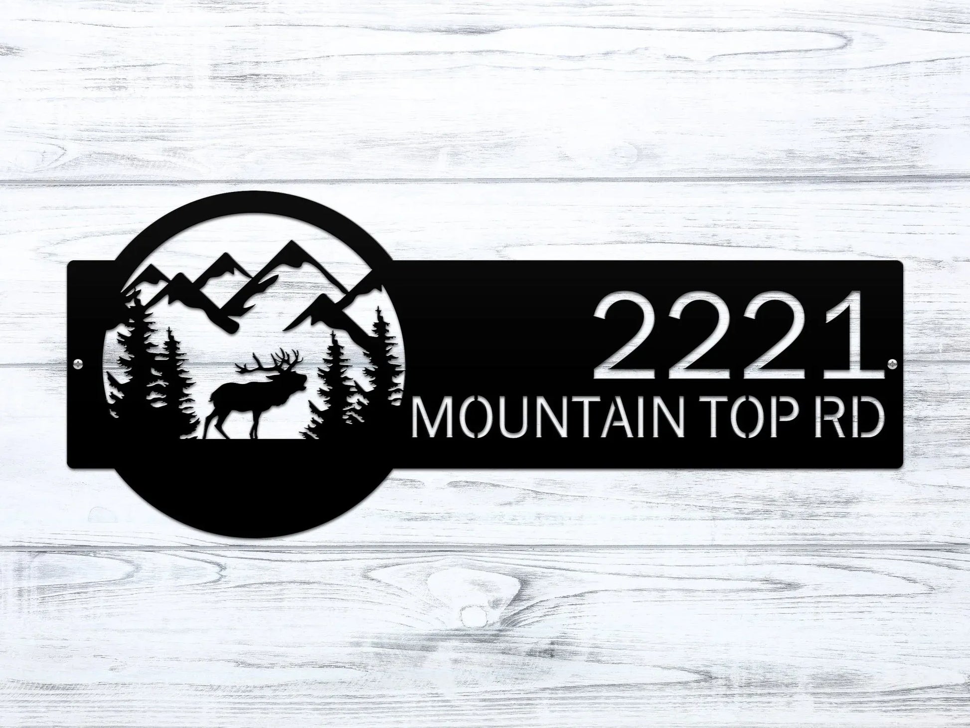 Close-up of Black Mountain Elk Address Sign featuring elk, pine trees, and mountain on the right, with house number '2221 Mountain Top Rd' on the left.