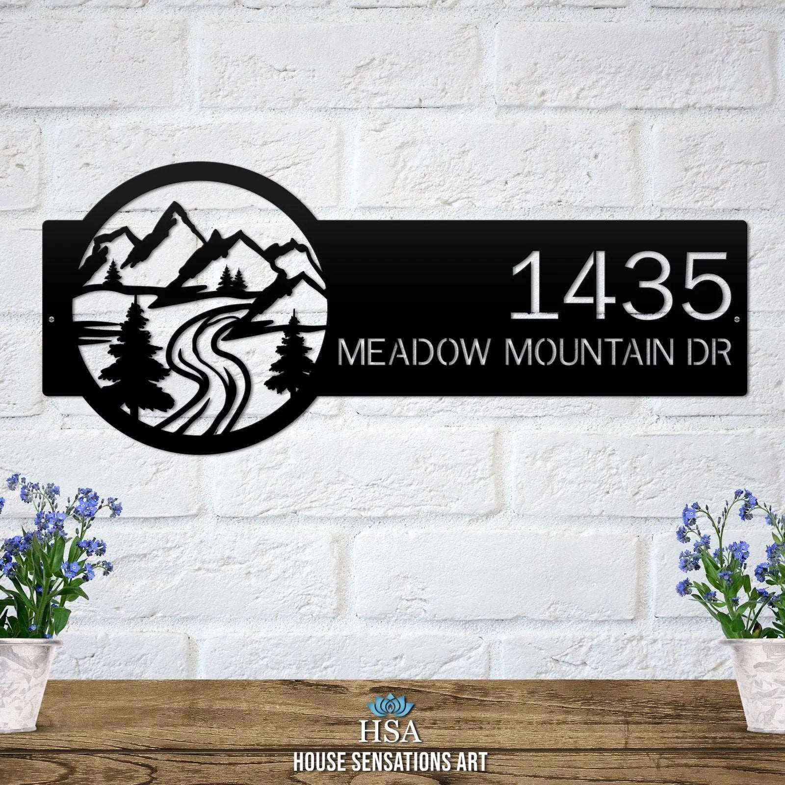Satin black Mountain Monogram Address Sign with mountain, pine tree, and  rode  on right, house number '1435 Meadow Mountain Dr' left.