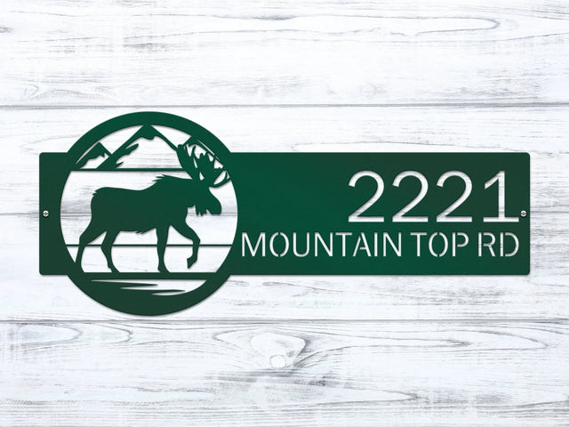 Close-up of bionic green Mountain Moose Address Sign with moose and mountain on right and house number '2221 Mountain Top Rd'.