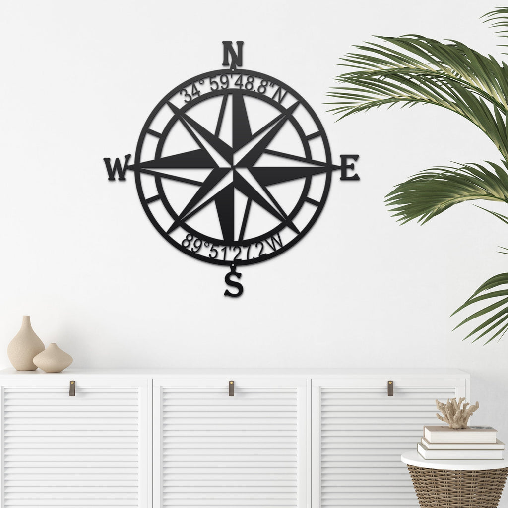 Black nautical compass rose metal wall décor on white wall with decorative accents, coastal-inspired décor, HouseSensationsArt