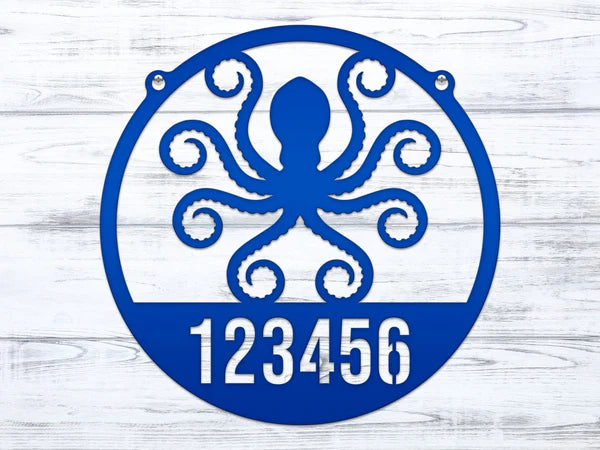 Round royal blue Address Sign with custom metal house number '123456' and detailed octopus design at the center.