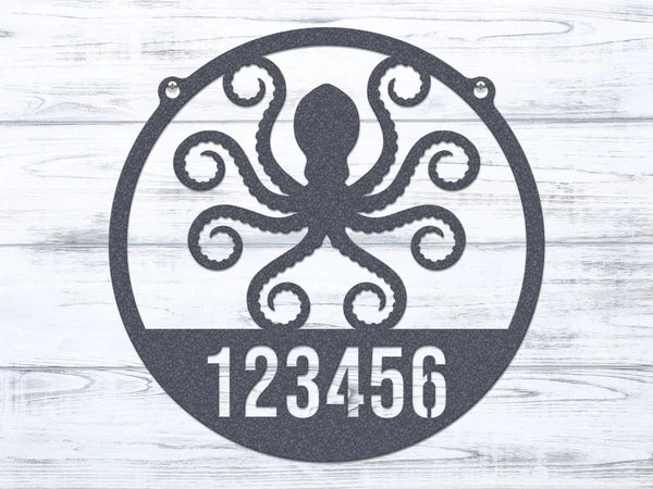 Round black chrome Address Sign with custom metal house number '123456' and detailed octopus design at the center.