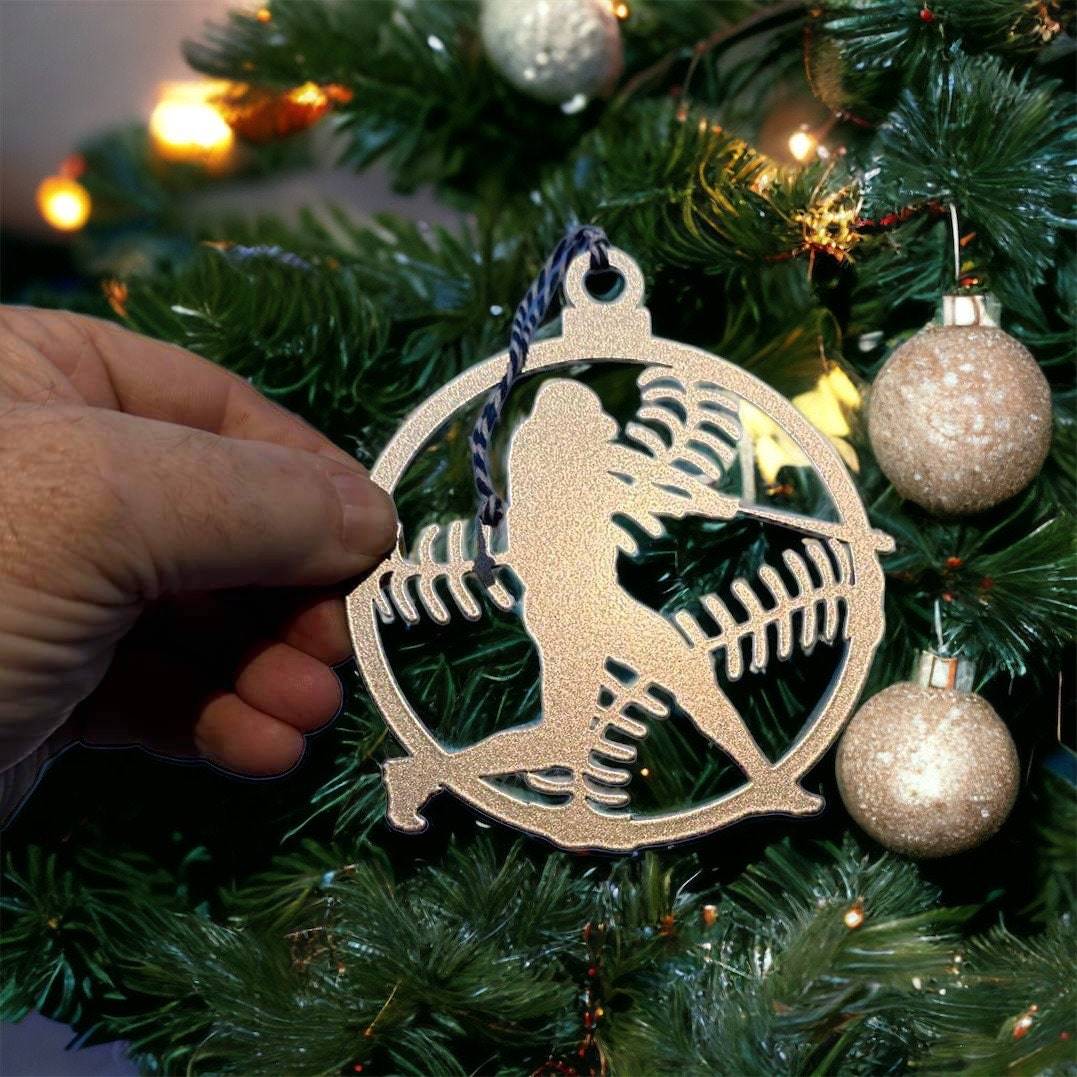 Decorative ornament with fish and hook design hanging on Christmas tree, festive holiday décor for seasonal display and fishing-themed Christmas decorations