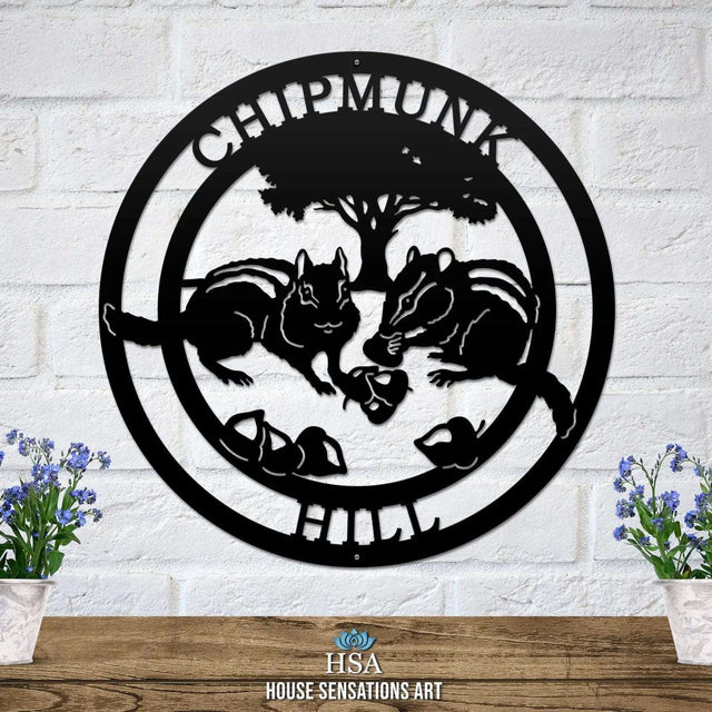 Black laser cut ranch sign with two chipmunk silhouettes and “CHIPMUNK” text arcing right; rustic woodland decor.