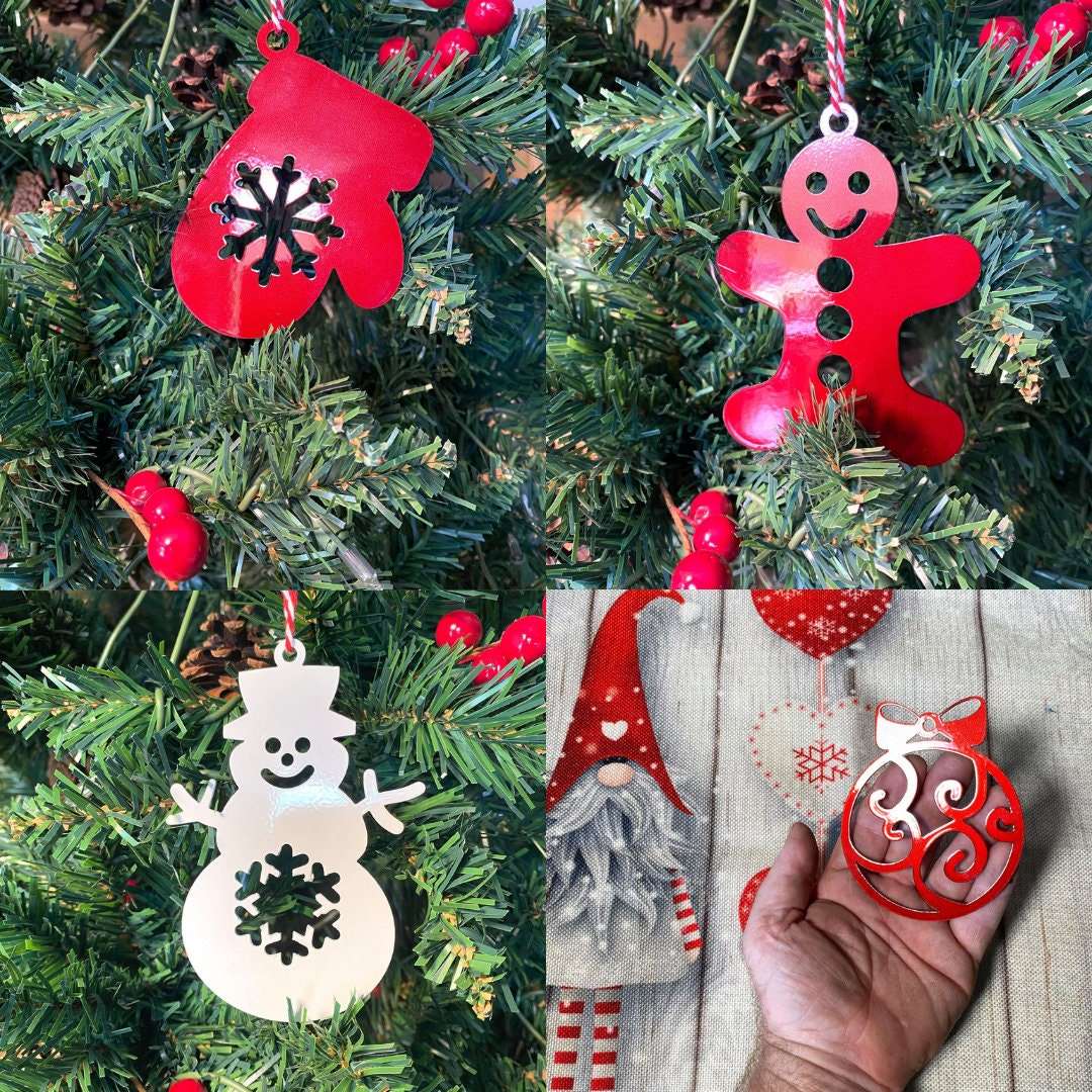 Collage of Christmas ornaments including red mitten, gingerbread man, snowman, and cat, displayed on tree and held by hand, festive holiday decorations for seasonal décor and Christmas celebration