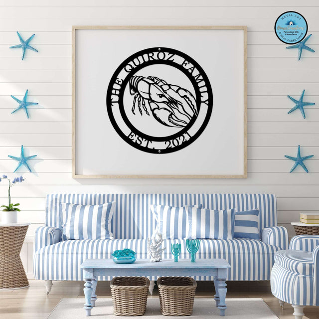 A black custom laser cut metal sign showing crawfish in center, with “THE QUIROZ FAMILY EST 2021” text, beach-themed room decor.