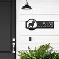 Personalized house address metal sign with dog silhouette, mounted on white wall next to black door, front door outdoor décor