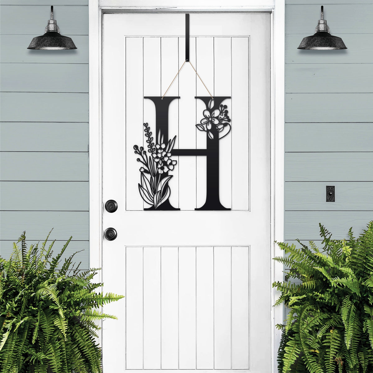 Personalized floral monogram metal door sign “H” on white door, black and white design, farmhouse entry décor, custom front porch wall art with plants