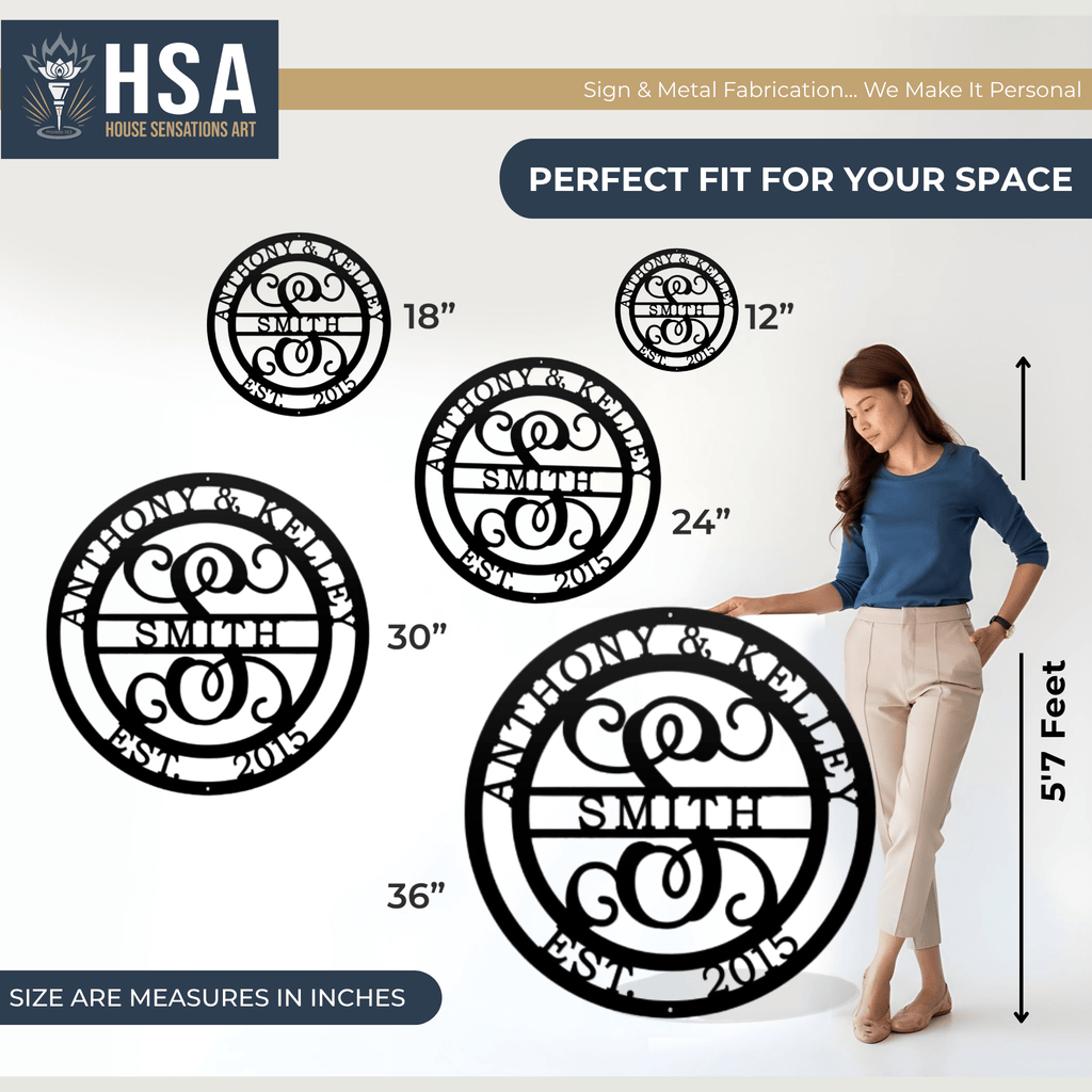Woman standing next to large monogrammed metal art pieces with displayed measurements, featuring “HSA” branding, highlighting size, scale, and detailed craftsmanship of the custom designs.