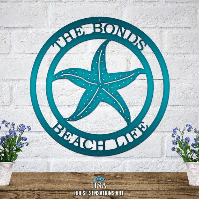 Candy teal custom laser cut metal beach sign with starfish and “THE BONDS BEACH LIFE” text, coastal outdoor decor.
