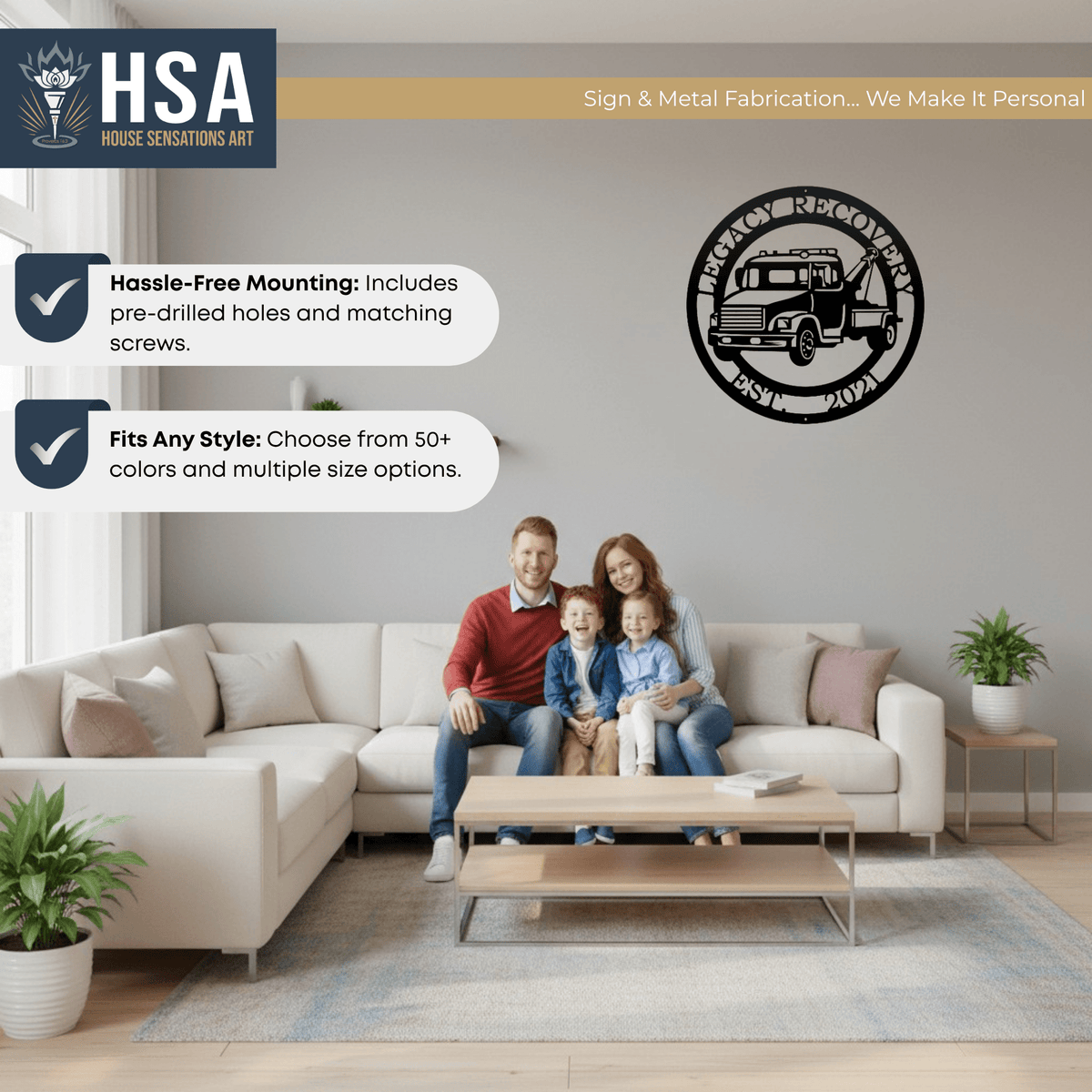 Family sitting on a couch in a living room with a metal wall art piece featuring a truck design displayed on the wall, creating a warm and inviting home décor scene.
