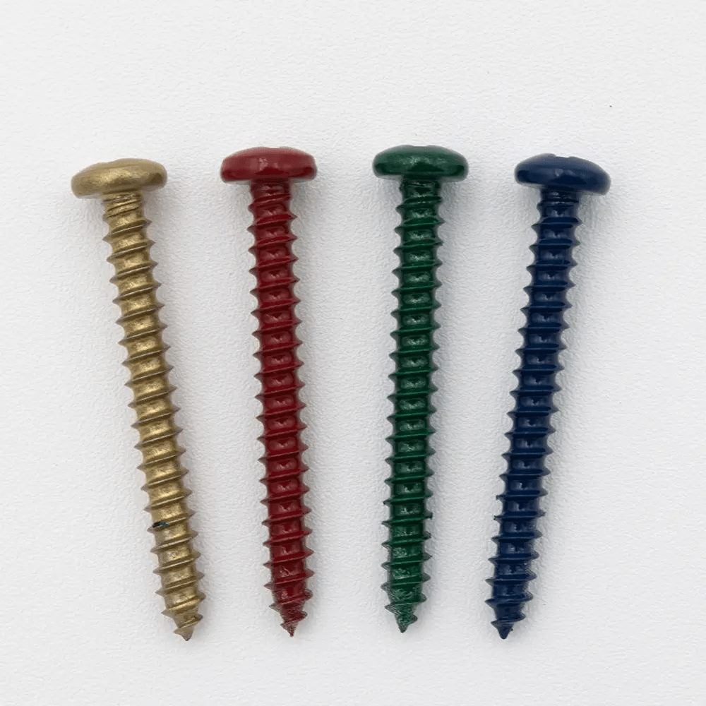 Four colored powder-coated screws (bronze, red, green, blue) on white background, for mounting custom metal signs and DIY projects