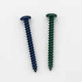 Two powder-coated screws, blue and green, on white background for mounting custom metal signs and DIY projects