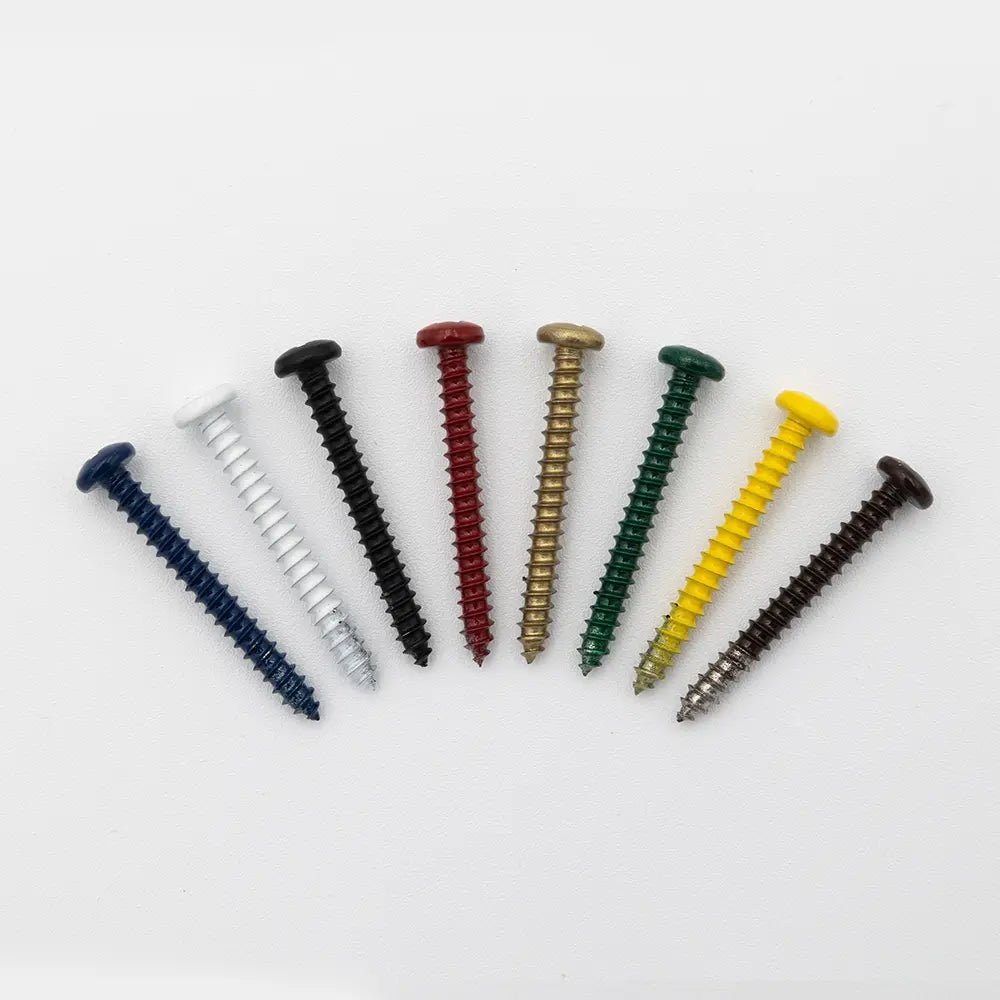 Assorted powder-coated screws in multiple colors on white background, model 7611302, for mounting custom metal signs and DIY projects