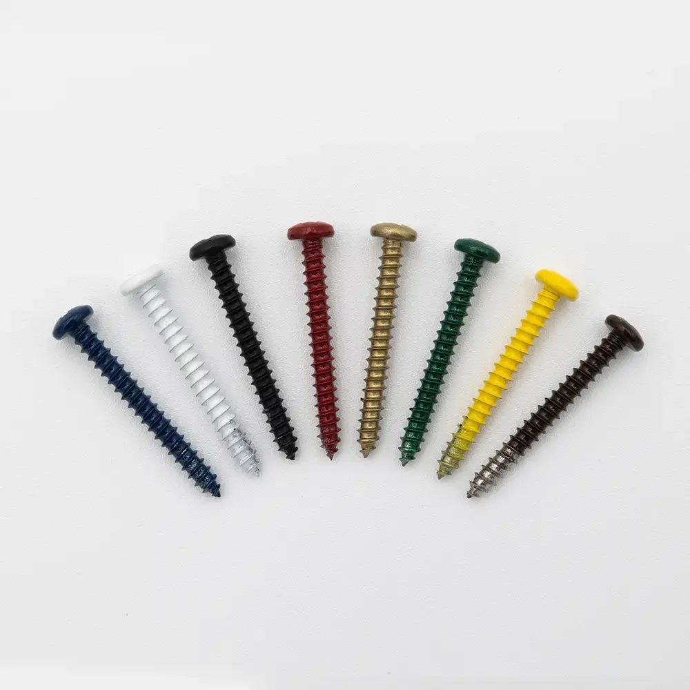 Assorted colored powder-coated screws (1/4 x 1 1/2, model 7611302) on white background, showcasing hardware options for mounting custom metal signs and DIY projects