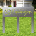 Metal sign with Vivian Kensington Photography logo on grassy outdoor background, custom laser-cut design for business branding and decorative outdoor display